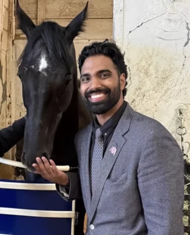 Kevin Sengara, founder of Claim To Fame Racing, with a thoroughbred