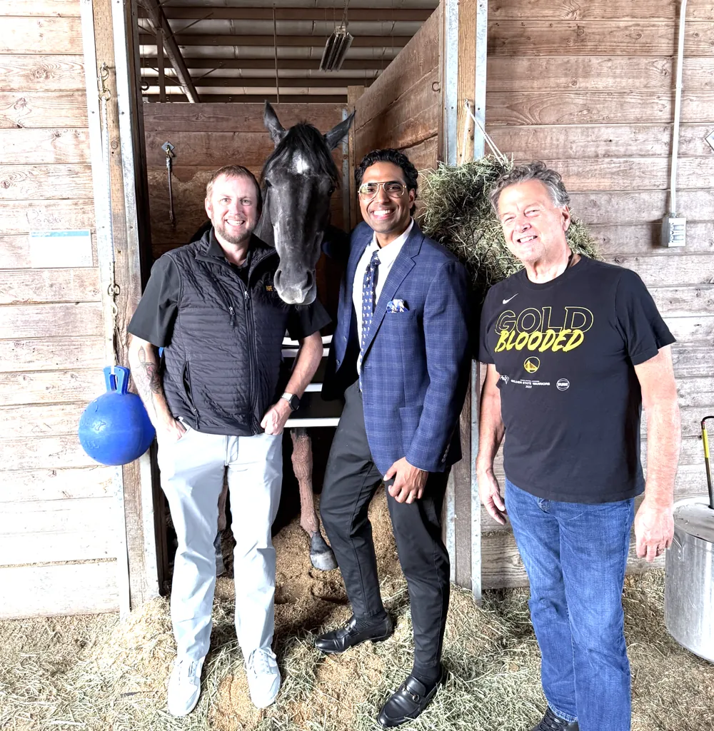Owners meeting one of the CTF horses with the training team at the barn